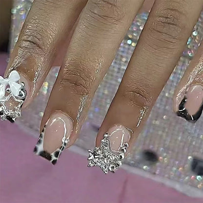 Acrylic nail set with glamorous starlights and elegant embellishments Acalora
