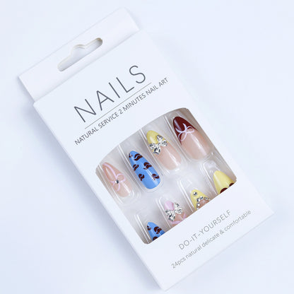 Artificial nails with playful heart and flower design Acalora