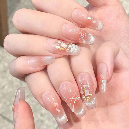Artificial nail set with elegant glitter and flower decorations Acalora