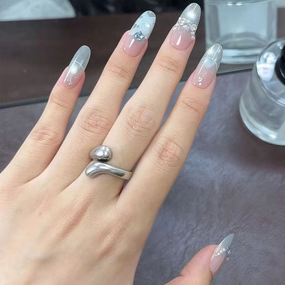 Artificial nail set with glamorous 3D details and radiant accents Acalora