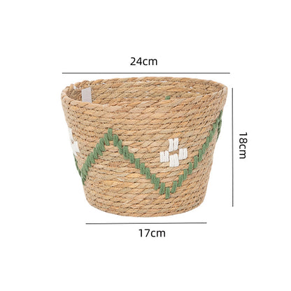 Handwoven storage basket with colorful accents Acalora