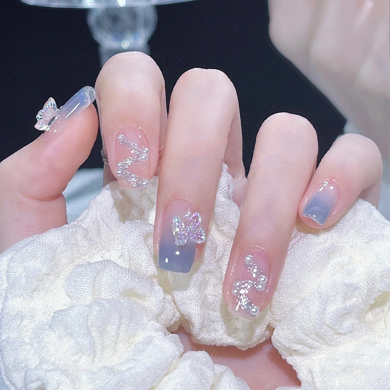 Acrylic nail set with sparkling glitter elements and appealing ombre design Acalora