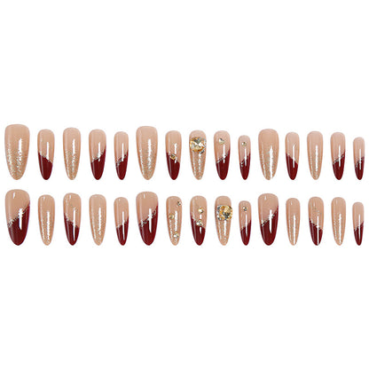 Acrylic nail set with elegant glitter design and exclusive embellishments Acalora