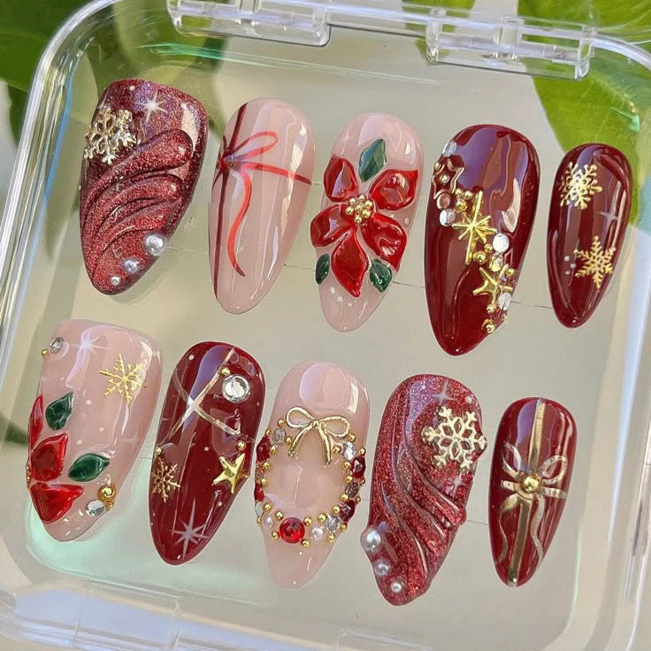 Artificial nail set in festive winter design with glamorous accents Acalora