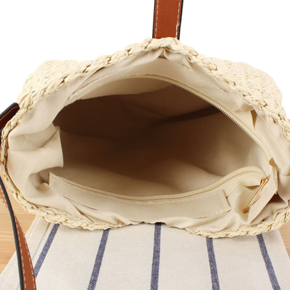 Braided shoulder bag with elegant leather accents Bowlift