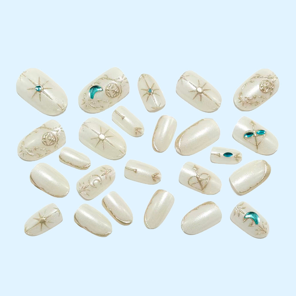 Artificial nails with elegant jewelry embellishments Acalora