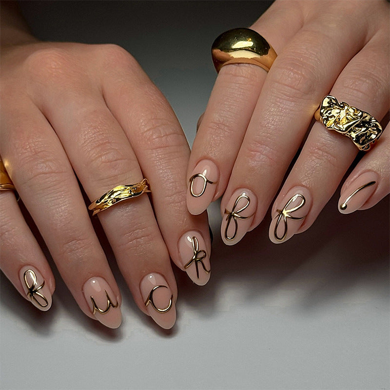 Elegant Press-On Nail Art Set with Stylish Gold Accents Acalora
