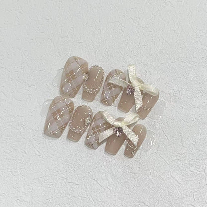 Elegant Press-On Nail Art Set with Ribbons and Gemstone Accents Acalora