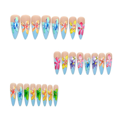 Artificial nails in a playful flower design with glittering accents Acalora