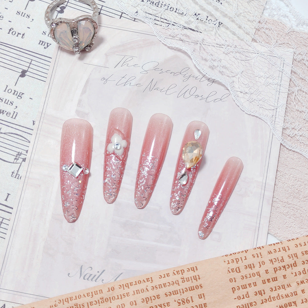Artificial nail set with glitter and flower accents Acalora