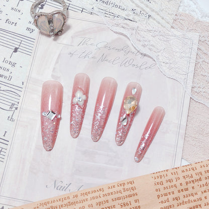 Artificial nail set with glitter and flower accents Acalora