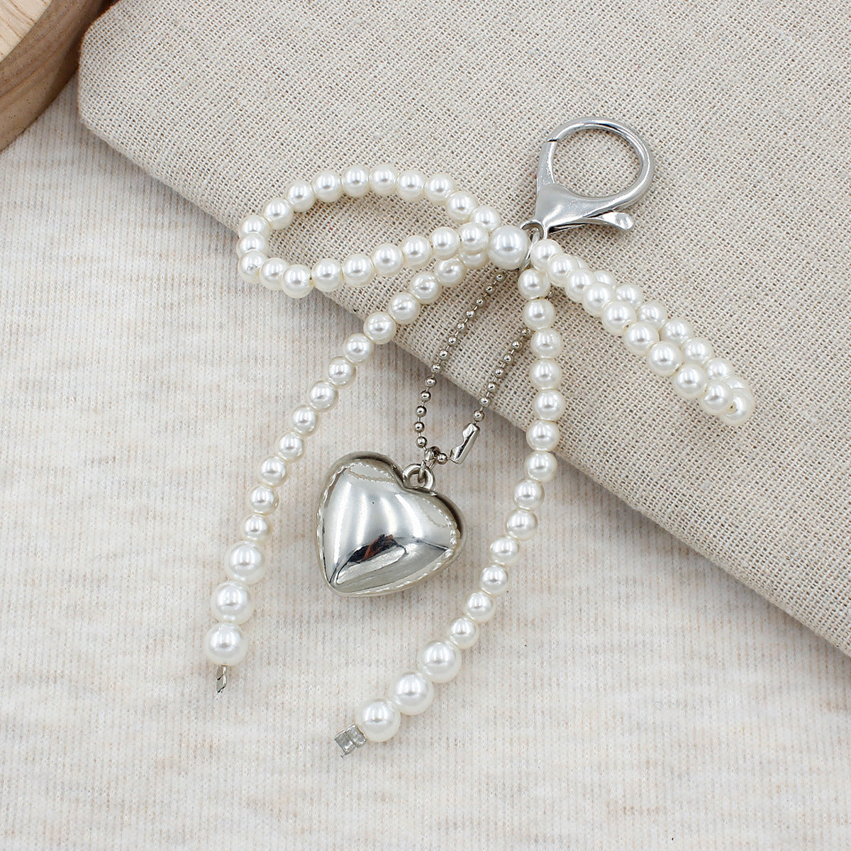 Elegant Pearl Bow Keychain Acalora