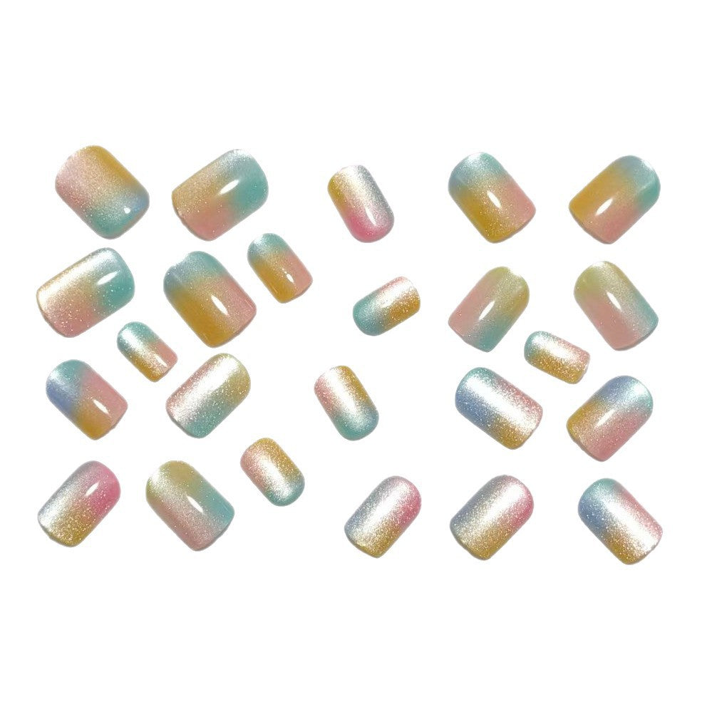 Artificial nails in delicate ombre design with glitter effects Acalora