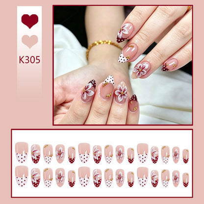 Artificial nail set with floral design and golden accents Acalora