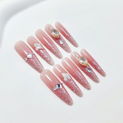 Artificial nail set with glitter and flower accents Acalora