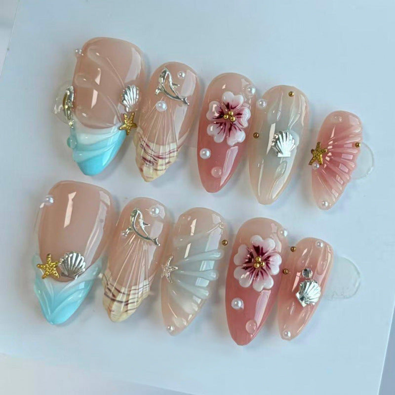 Acrylic nail set with filigree shell and flower decorations Acalora