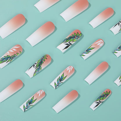 Artificial nails with elegant ombre design and floral accents Acalora