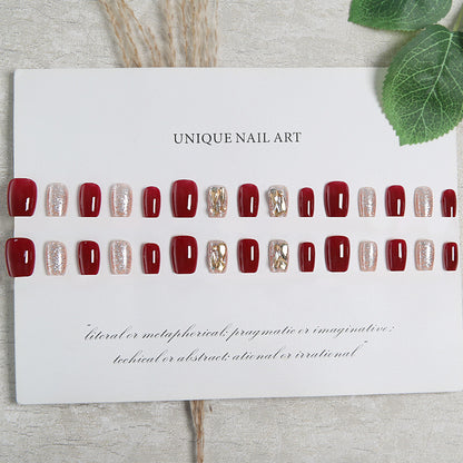 Artificial nail set with elegant glitter and metallic accents Acalora