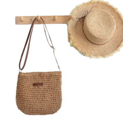 Handwoven shoulder bag with brown leather accent Skanto