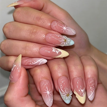 Artificial nail set with intricately detailed floral designs and shine accents Acalora