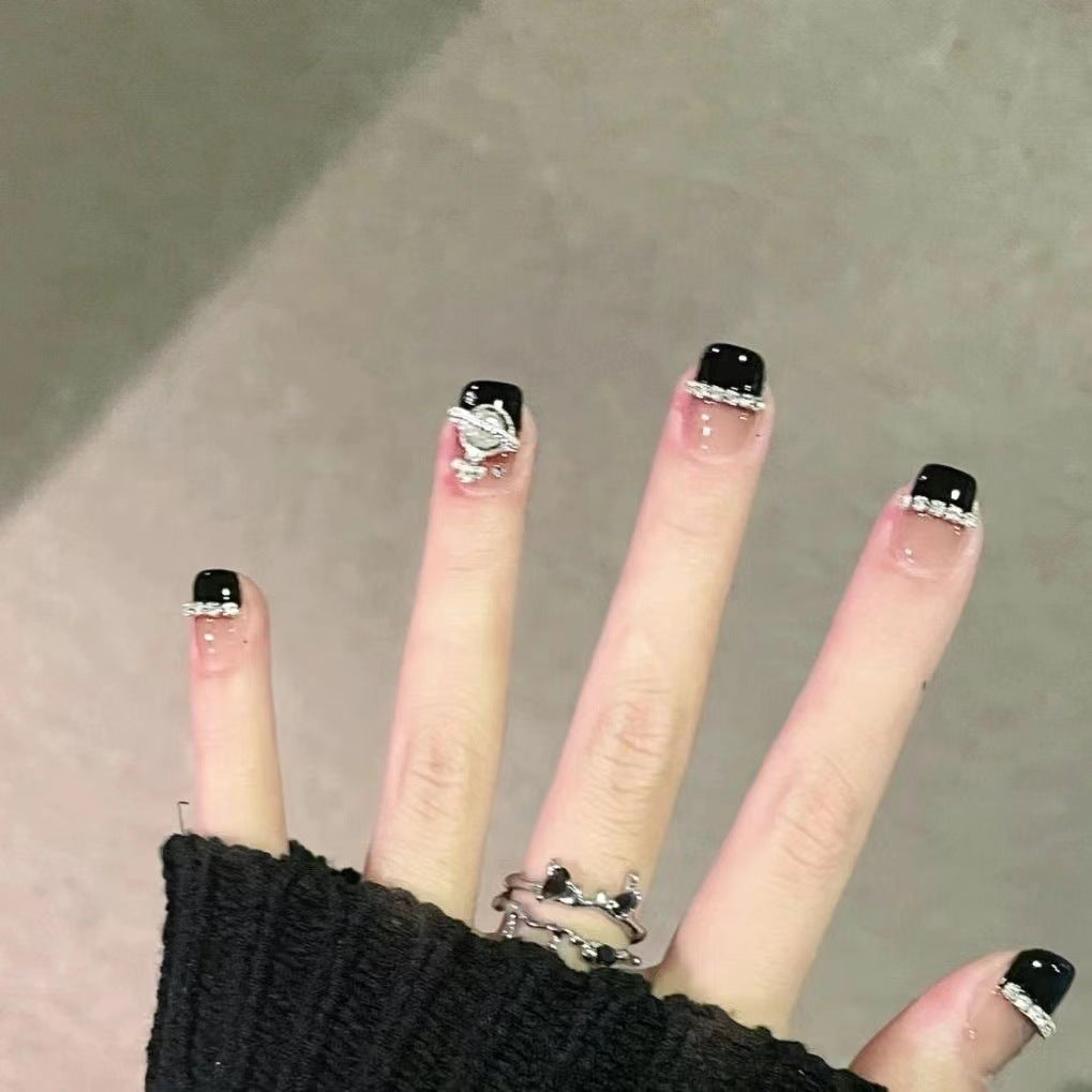 Glamorous artificial nail set with sparkling crystal embellishments Acalora