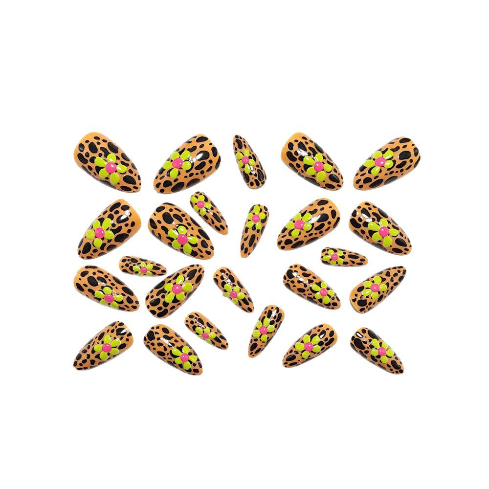 Artificial nails in modern animal patterns with floral accents Acalora