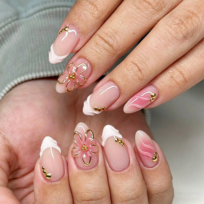 Nail set with elegant floral and glitter elements Acalora