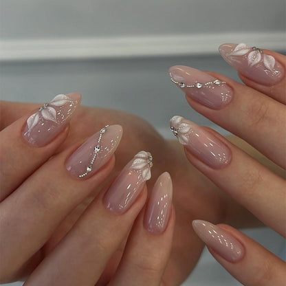 Artificial nail set with elegant flower designs and shimmering accents Acalora