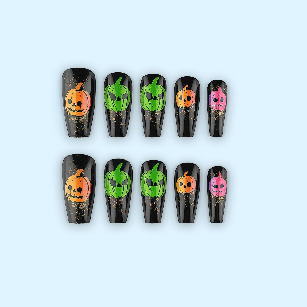 Halloween-style artificial nails with graphic pumpkin designs Acalora