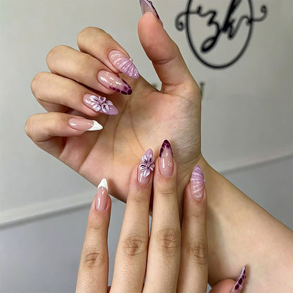 Artificial nail set with elegant ombre design and floral accents Acalora