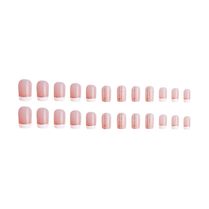 Nail set with elegant French tip and fashionable embellishments Acalora