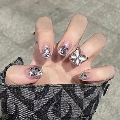 Nail art set with sparkling rhinestones and glitter elements Acalora