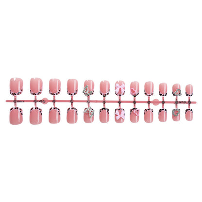 Decorative Press-On Nail Set with Artistic Bow and Heart Accents Acalora