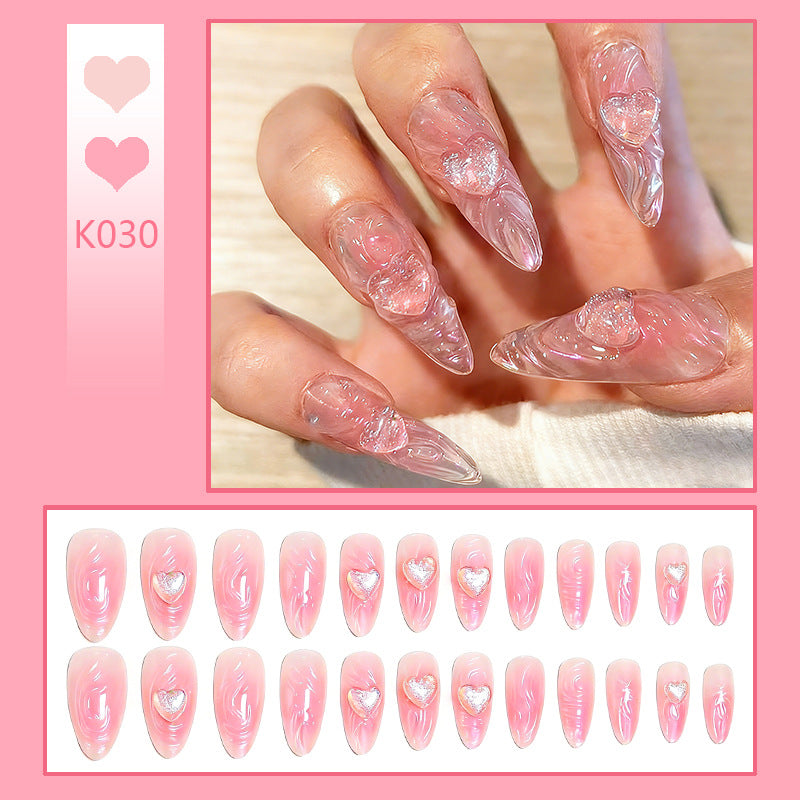 Artificial nail set with 3D heart decorations and shimmering accents Acalora