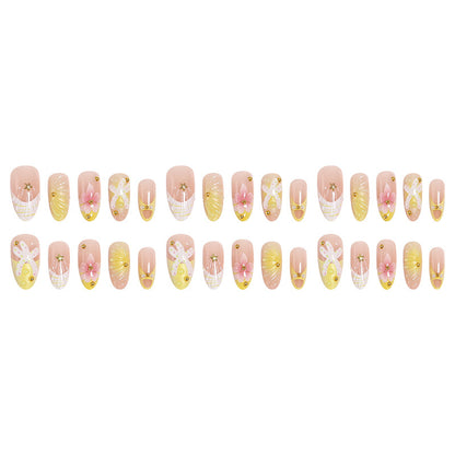 Artificial nail set with glamorous floral designs and creative glitter accents Acalora