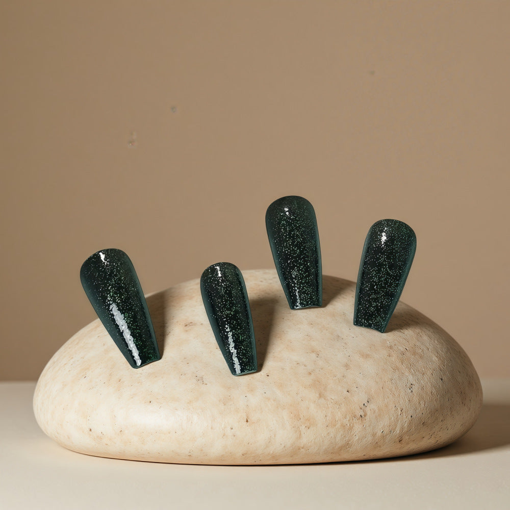 Shiny artificial nails with sparkling accents Acalora