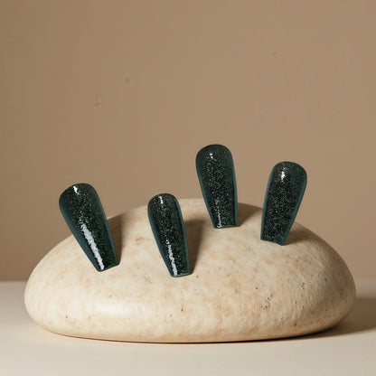 Shiny artificial nails with sparkling accents Acalora