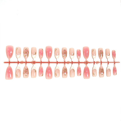 Nail set with elegant floral and glitter elements Acalora