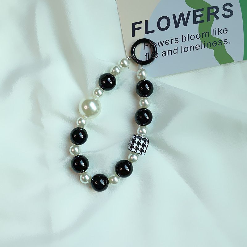 Elegant Pearl and Black Bead Charm Bracelet Acalora