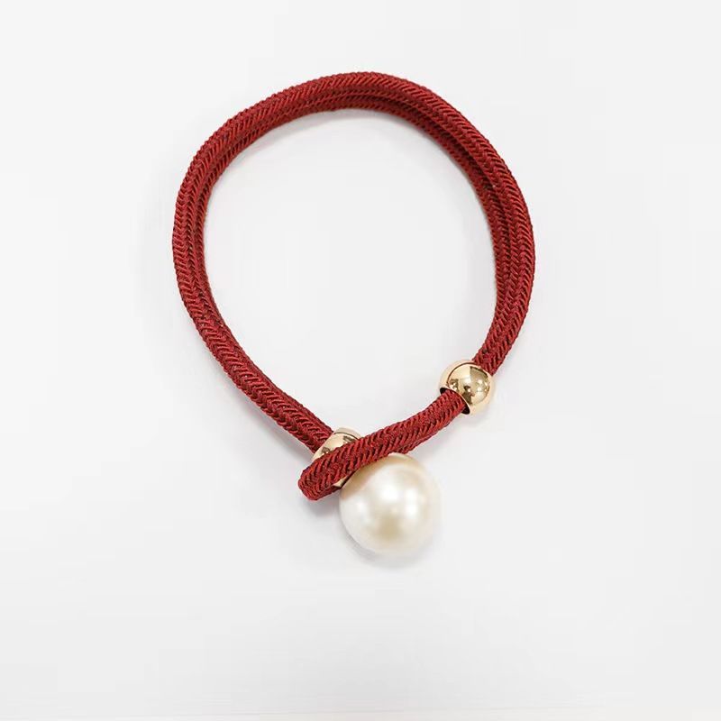 Elegant curtain tieback with decorative pearl Acalora