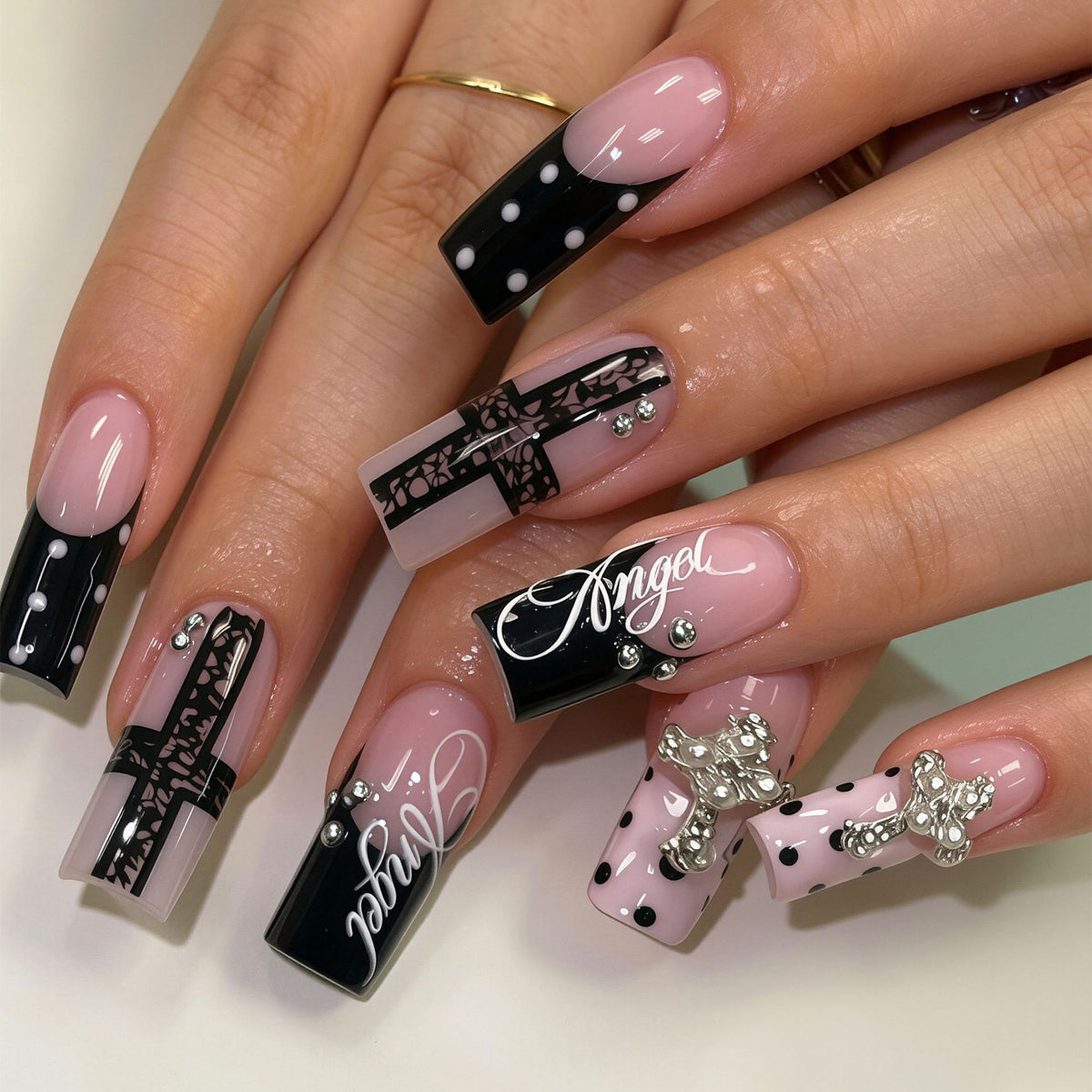 Artistic Long Press-On Nail Design Set with Cross Accents Acalora