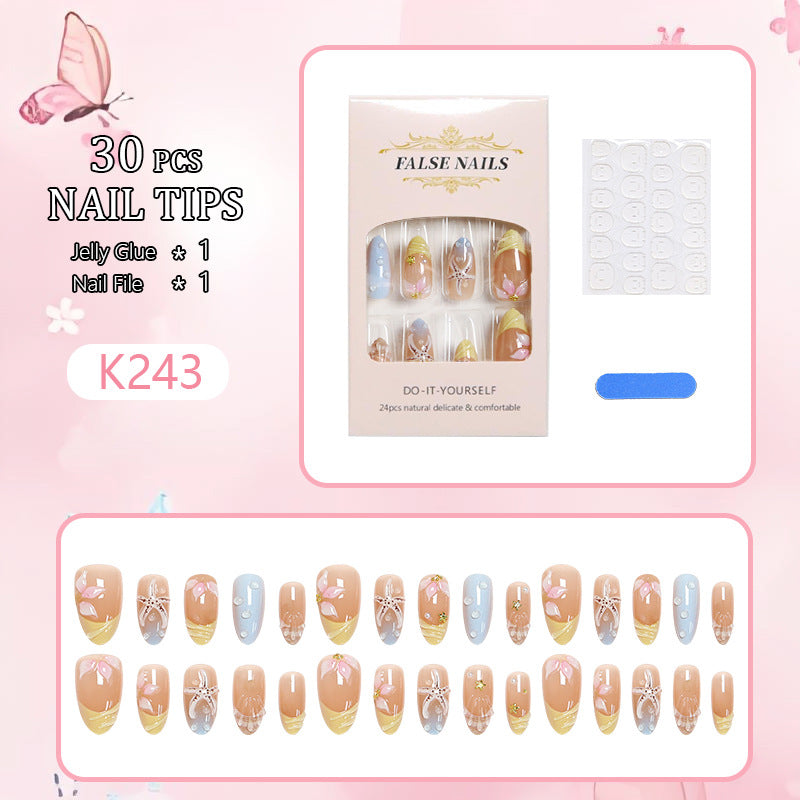 Artificial nail set with floral motifs and glitter accents Acalora