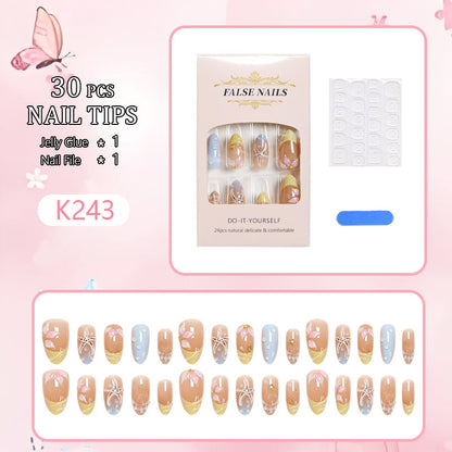 Artificial nail set with floral motifs and glitter accents Acalora