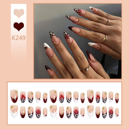Artificial nail set with elegant floral patterns and glamorous details Acalora