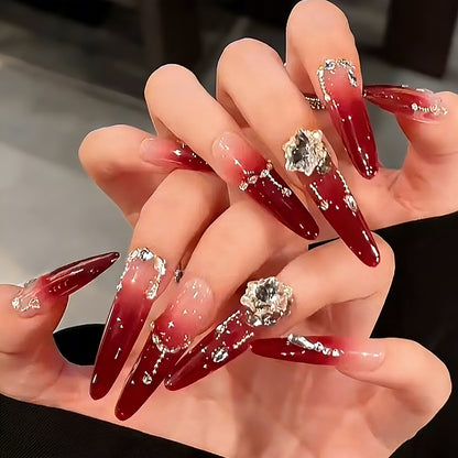 Artificial nails with elegant glitter and jewelry accents Acalora