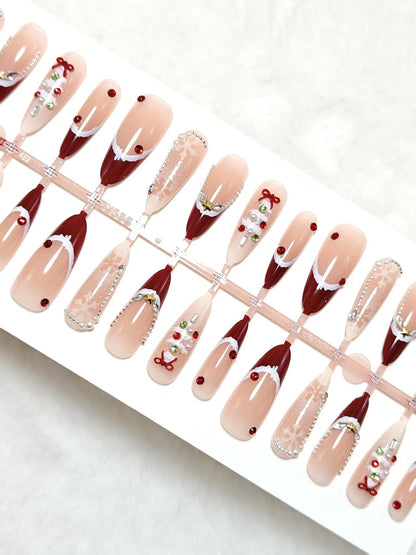 Artificial nails with festive designs and glitter accents Acalora