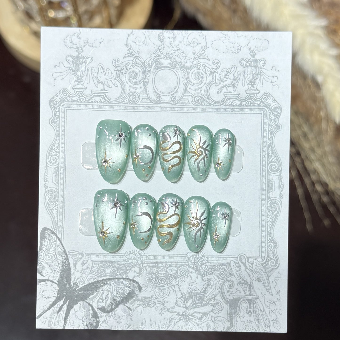 Decorative Press-On Nail Set with Celestial Accents Acalora