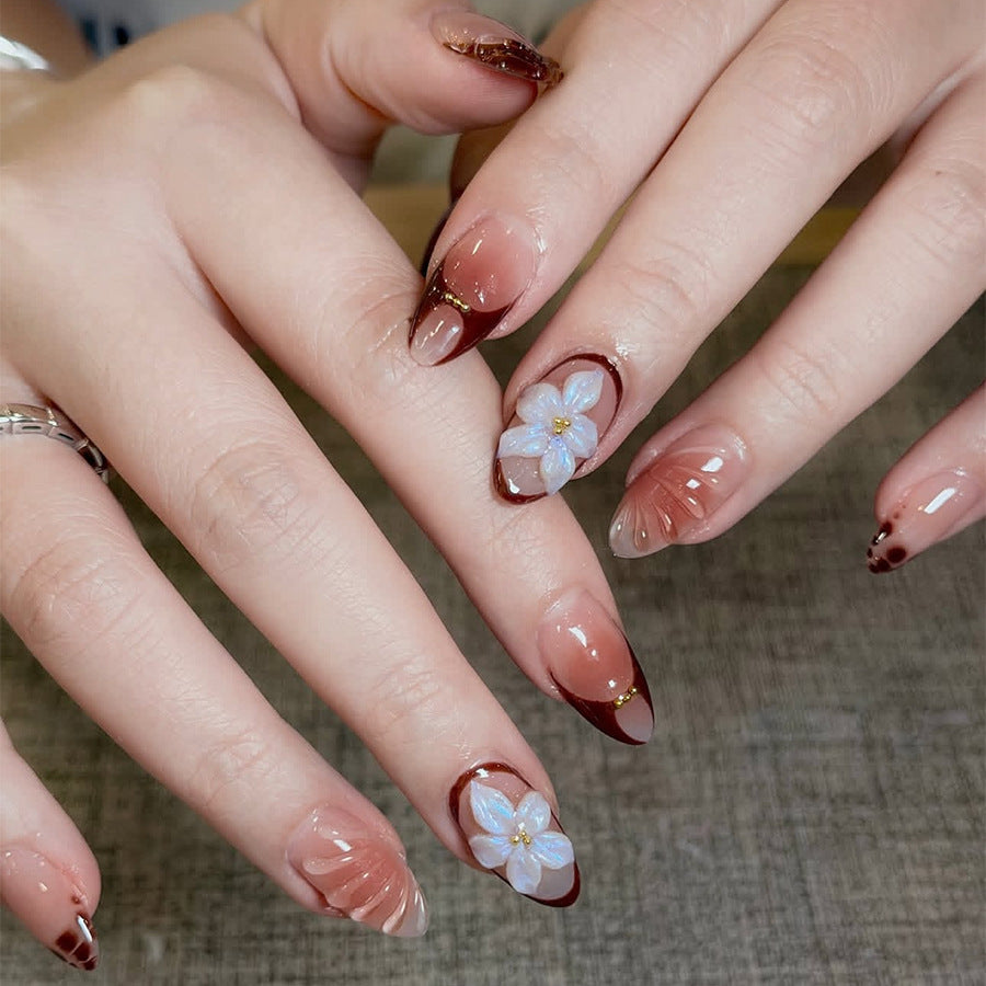 Artificial nail set with floral 3D applications and elegant gradient design Acalora