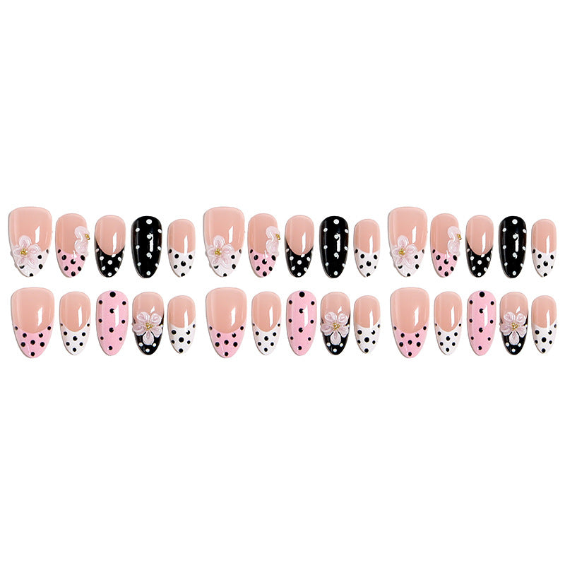 Nail art set with floral accents and elegant dots Acalora