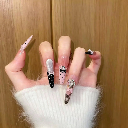 Artificial nail set with glamorous 3D applications and festive design Acalora